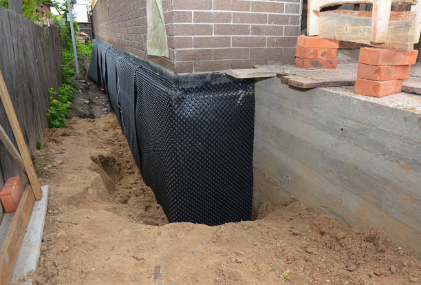 SJ Waterproofing Pros technician performing targeted Vapor Barrier Installation assessment in Conyers, GA